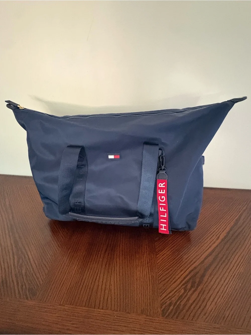 Tommy Hilfiger Navy Duffel with Red Logo Tag